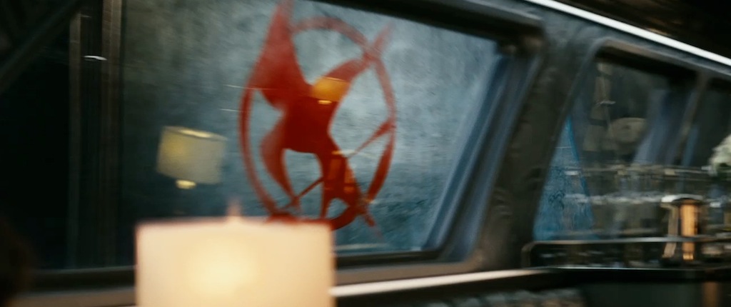 The Hunger Games Catching Fire Trailer Screenshot Mockingjay Graffiti