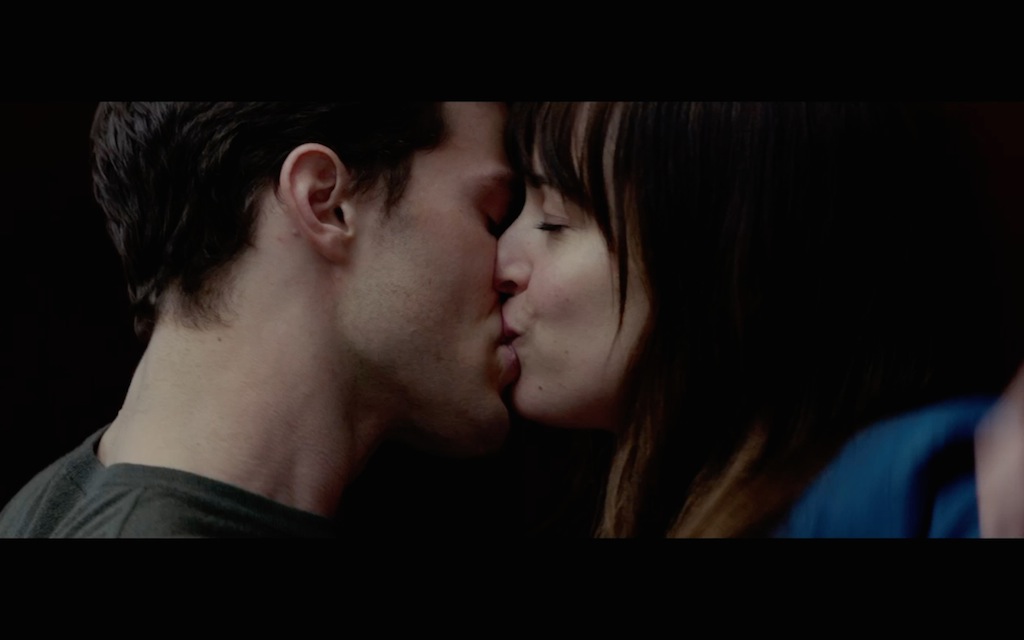 Fifty Shades of Grey Teaser Screenshot Christian and Anastasia Kissing