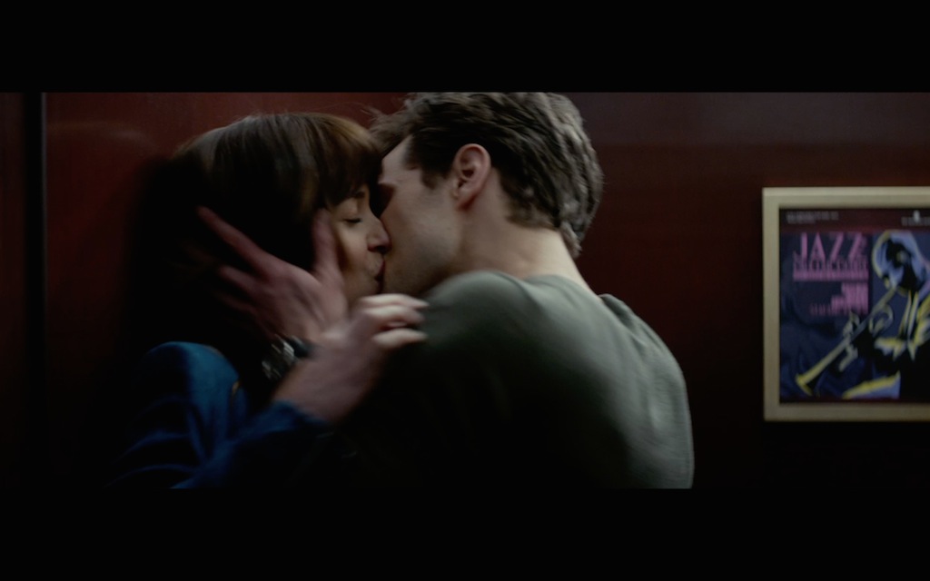 Fifty Shades of Grey Teaser Screenshot Kissing Christian and Anastasia