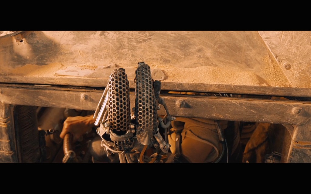 Mad Max Fury Road Comic Con Trailer Screenshot Furiosa Claw Hand