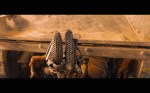 Mad Max Fury Road Comic Con Trailer Screenshot Furiosa Claw Hand