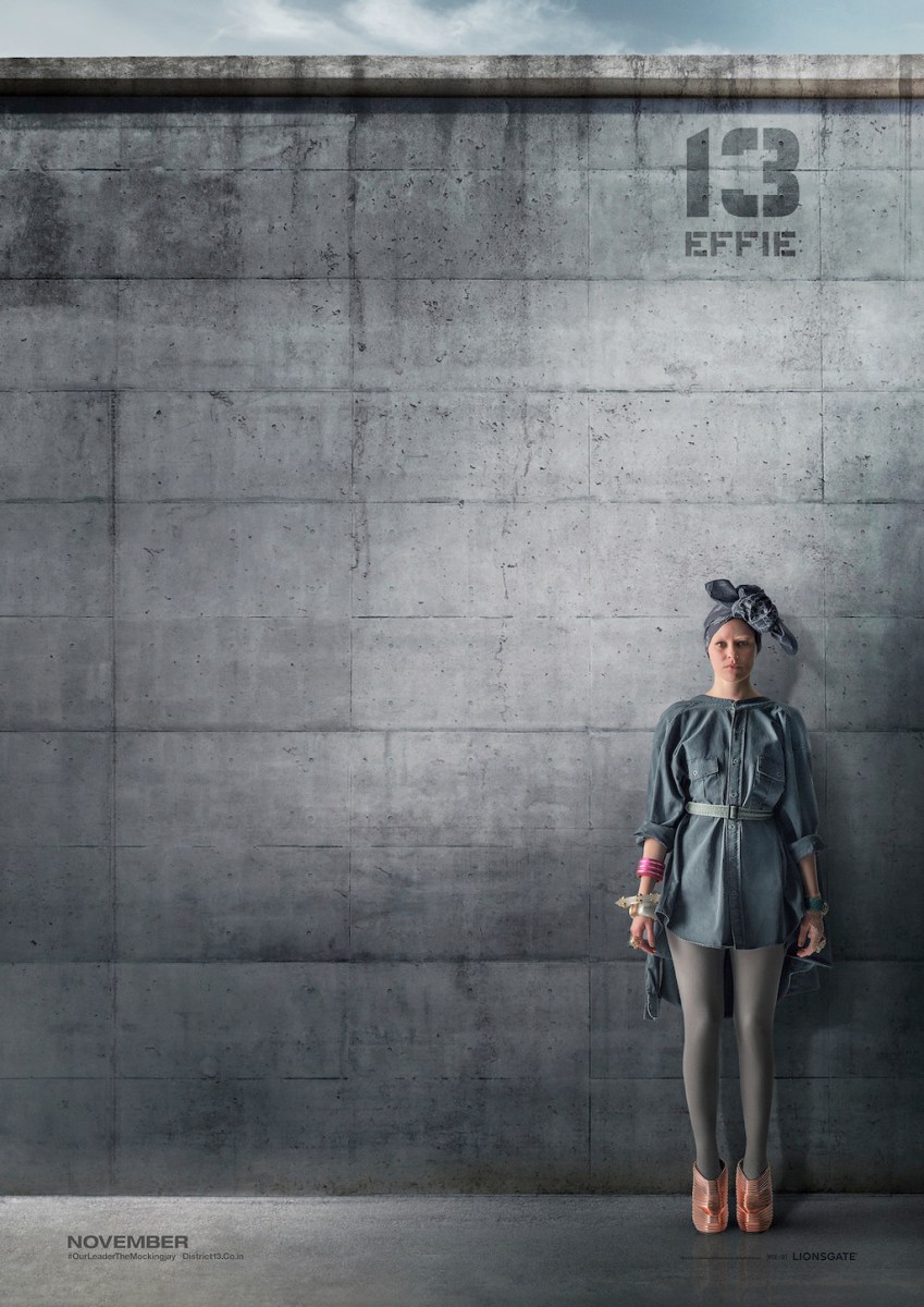 The Hunger Games Mockingjay Part 1 District 13 Poster Effie Trinket