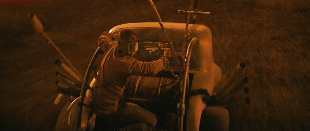 Mad Max Fury Road Screenshot Tom Hardy Back of Car